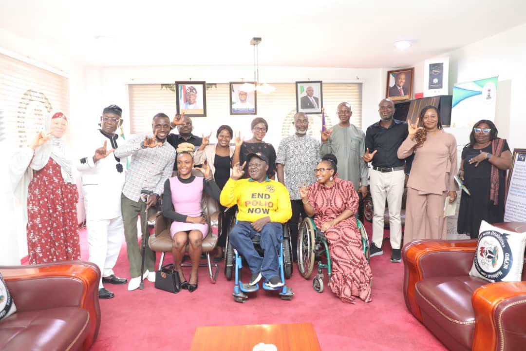 Hon. Ayuba Burki Gufwan, during a courtesy visit by the Founder of Sauri Growth Initiatives for Women and Youth with Disabilities, Miss Comfort Ekwo