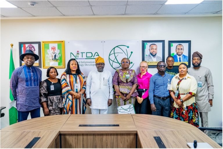 Only 47% of Government Digital Platforms Meet Accessibility Threshold, CID Study Finds A group of people from the Centre for Inclusive Development and NITDA pose for a group photograph in a NITDA conference room, standing in front of the agency’s logo and portraits of officials.